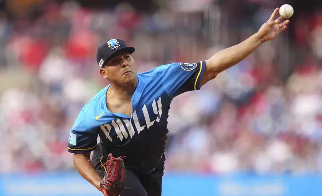 Philadelphia Phillies pitcher Ranger Suárez throws during the first inning of a baseball game against the Toronto Blue Jays, Friday, June 13, 2025, in Philadelphia. (AP Photo/Derik Hamilton)