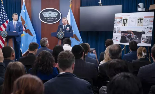 Joint Chiefs Chairman Gen. Dan Caine, right, speaks during a news conference with Defense Secretary Pete Hegseth at the Pentagon, Thursday, June 26, 2025 in Washington. (AP Photo/Kevin Wolf)