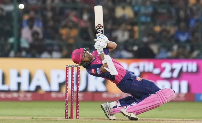 Rajasthan Royals' Yashasvi Jaiswal plays a shot during the Indian Premier League cricket match against Royal Challengers Bengaluru in Bengaluru, India, Thursday, April 24, 2025. (AP Photo/Aijaz Rahi)