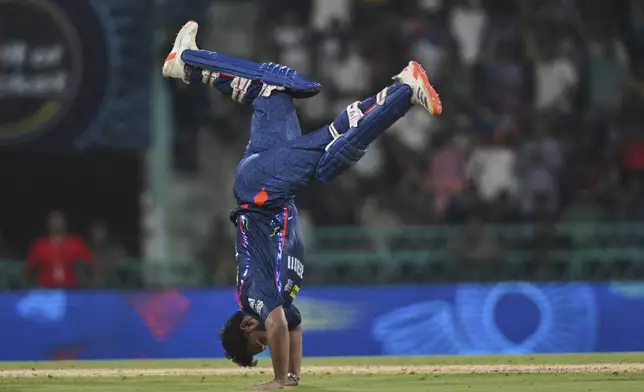 Lucknow Super Giants' captain Rishabh Pant celebrates after scoring a century during the Indian Premier League cricket match against Royal Challengers Bengaluru in Lucknow, India, Tuesday, May 27, 2025. (AP Photo)