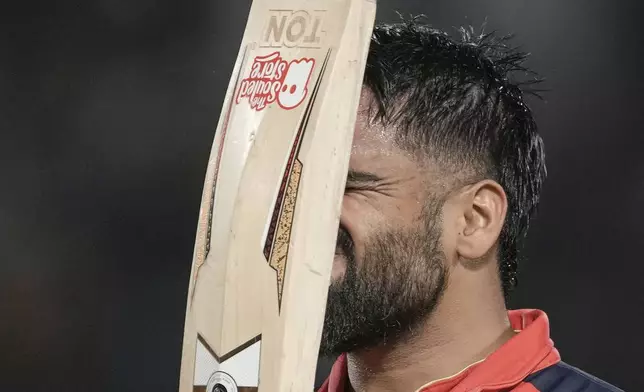 Punjab Kings' Prabhsimran Singh reacts as he walks off the field after being dismissed during the Indian Premier League cricket match against Lucknow Super Giants in Dharamshala, India, Sunday, May 4, 2025. (AP Photo/Ashwini Bhatia)