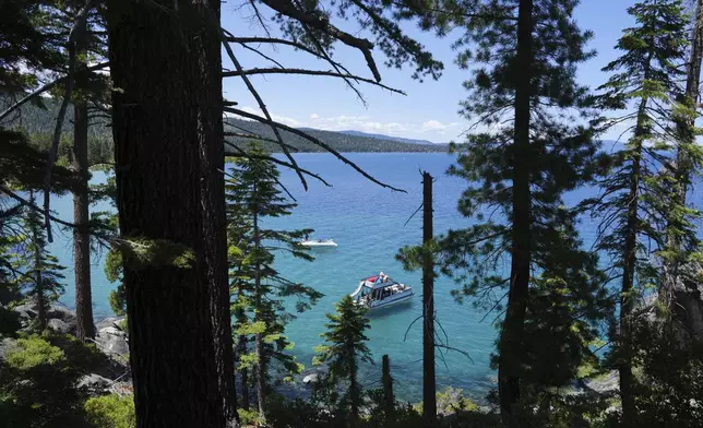 A boat carries visitors at D.L. Bliss State Park after a weekend incident in which a boat capsized, killing several people, on Monday, June 23, 2025, in Lake Tahoe, Calif. (AP Photo/Brooke Hess-Homeier)