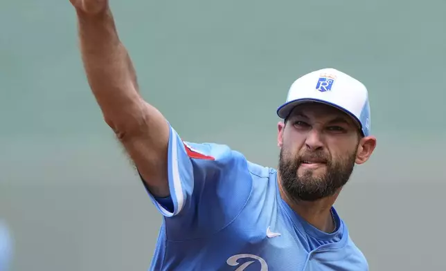 Kansas City Royals starting pitcher Michael Wacha throws during the first inning of a baseball game against the Detroit Tigers, Saturday, May 31, 2025, in Kansas City, Mo. (AP Photo/Charlie Riedel)
