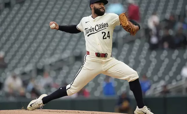Minnesota Twins starting pitcher Simeon Woods Richardson delivers during the first inning a baseball game against the Seattle Mariners, Thursday, June 26, 2025, in Minneapolis. (AP Photo/Abbie Parr)