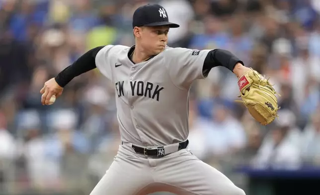 New York Yankees starting pitcher Will Warren throws in the first inning of a baseball game against the Kansas City Royals, Thursday, June 12, 2025, in Kansas City, Mo. (AP Photo/Ed Zurga)