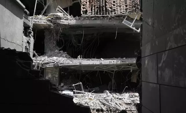 Damages are seen in buildings after an Israeli strike last week, in Tehran, Iran, Wednesday, June 25, 2025. (AP Photo/Vahid Salemi)