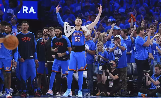 Oklahoma City Thunder center Isaiah Hartenstein (55) reacts after guard Luguentz Dort made a 3-pointer during the second half of Game 7 of the NBA Finals basketball series against the Indiana Pacers Sunday, June 22, 2025, in Oklahoma City. (AP Photo/Julio Cortez)