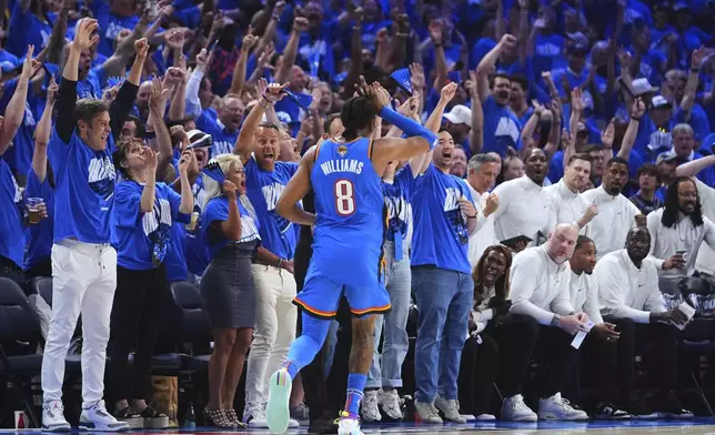 Oklahoma City Thunder forward Jalen Williams (8) reacts after making a 3-pointer during the second half of Game 7 of the NBA Finals basketball series against the Indiana Pacers Sunday, June 22, 2025, in Oklahoma City. (AP Photo/Julio Cortez)