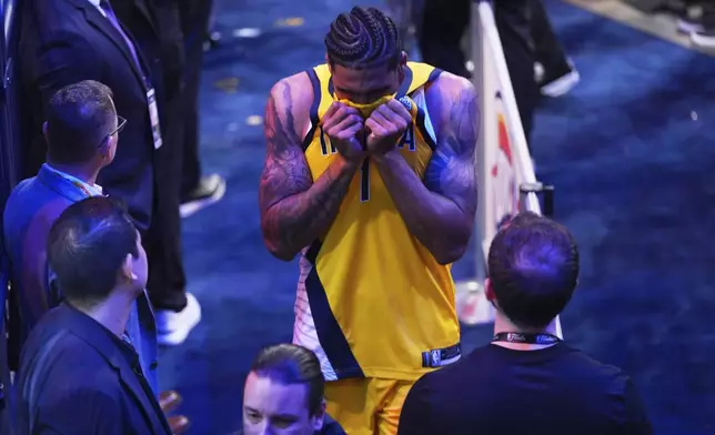 Indiana Pacers forward Obi Toppin (1) leaves the court after losing the NBA basketball championship in Game 7 against the Oklahoma City Thunder Sunday, June 22, 2025, in Oklahoma City. (AP Photo/Kyle Phillips)