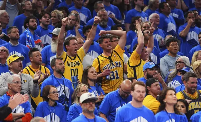 Indiana Pacers fans cheer during the second half of Game 7 of the NBA Finals basketball series against the Oklahoma City Thunder Sunday, June 22, 2025, in Oklahoma City. (AP Photo/Julio Cortez)