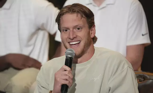 FILE - Grant House speaks during a players' association for college athletes meeting ahead of the college football's national title game, Saturday, Jan. 18, 2025, in Atlanta. (AP Photo/Brynn Anderson, File)