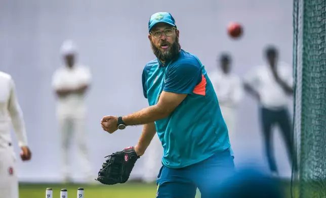 FILE - Australia's spin bowling coach Daniel Vettori bowls during a practice session ahead of their second cricket test match against India, in New Delhi, India, Thursday, Feb. 16, 2023. (AP Photo/Altaf Qadri, File)