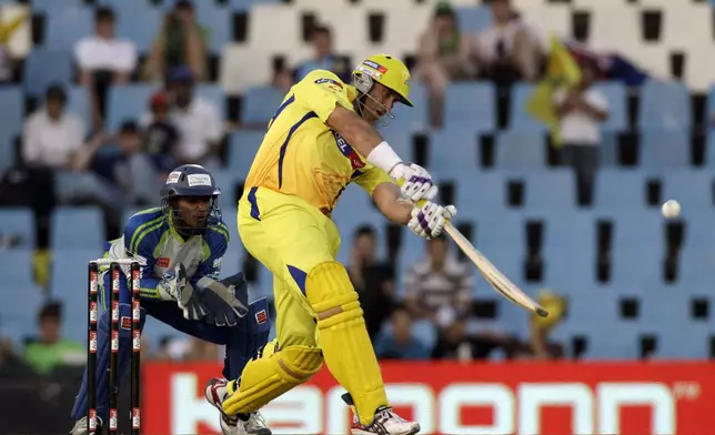 FILE - Chennai Super Kings batsman Matthew Hayden, right, plays a shot during the Champions League Twenty20 cricket match at the Supersport Park in Pretoria, South Africa, Wednesday, Sept. 15, 2010. (AP Photo/Themba Hadebe, File)