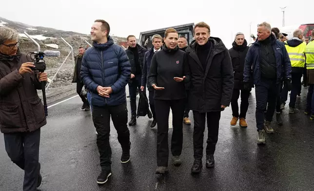 French President Emmanuel Macron arrives at Nuuk Airport in Nuuk, Greenland, on Sunday, June 15, 2025. The Chairman of the Naalakkersuisut, Jens-Frederik Nielsen, is hosting during the French President's visit, where Danish Prime Minister Mette Frederiksen is also participating. (Mads Claus Rasmussen/Scanpix via AP)