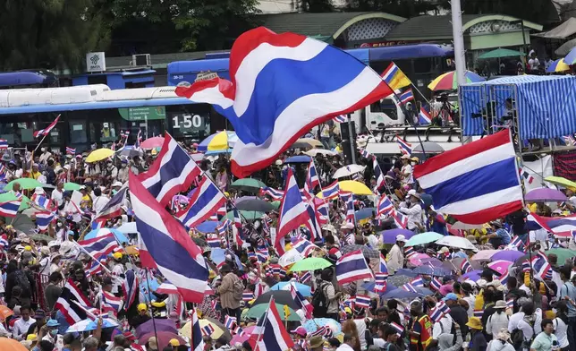 Protesters gather at Victory Monument demanding Thailand's Prime Minister Paetongtarn Shinawatra resign in Bangkok, Thailand, Saturday, June 28, 2025. (AP Photo/Sakchai Lalit)