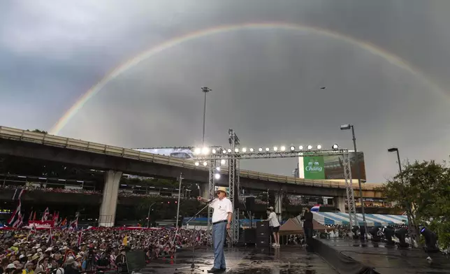 Co-leader protester Sondhi Limthongkul speaks to protester sat Victory Monument demanding Thailand's Prime Minister Paetongtarn Shinawatra resign in Bangkok, Thailand, Saturday, June 28, 2025. (AP Photo/Wason Wanichakorn)