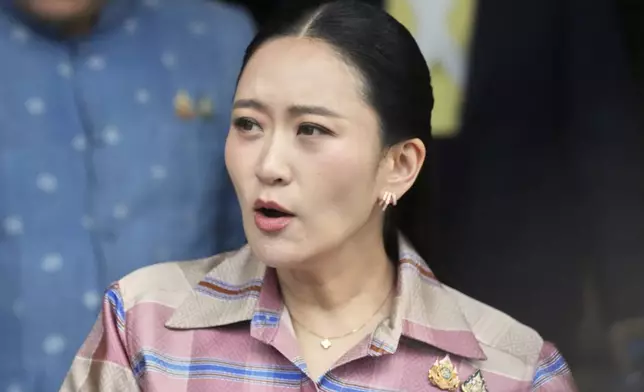 FILE - Thailand's Prime Minister Paetongtarn Shinawatra leaves after talking to reporters at Government house in Bangkok, Thailand, Tuesday, June 24, 2025. (AP Photo/Sakchai Lalit, File)