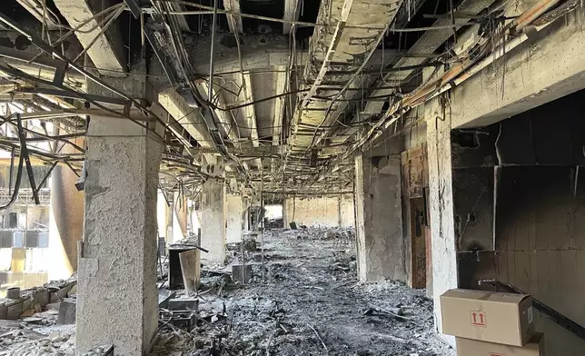 The damaged headquarters of Islamic Republic of Iran Broadcasting, Iranian state television, is seen in Tehran, Iran, Thursday, June 19, 2025. (AP Photo/Vahid Salemi)