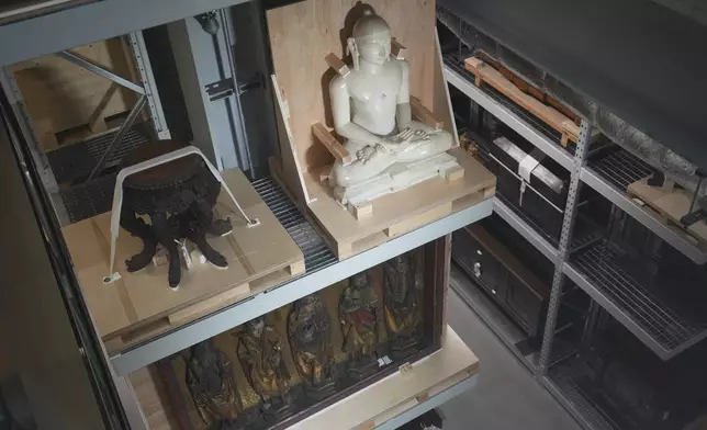 Religious artefacts on display at the V&amp;A Storehouse in London, Thursday, June 5, 2025. (AP Photo/Joanna Chan)