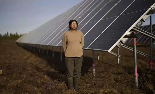 Jade Thurmond poses for a portrait at a construction site of a solar energy project Friday, May 23, 2025, in Galena, Alaska. (AP Photo/John Locher)