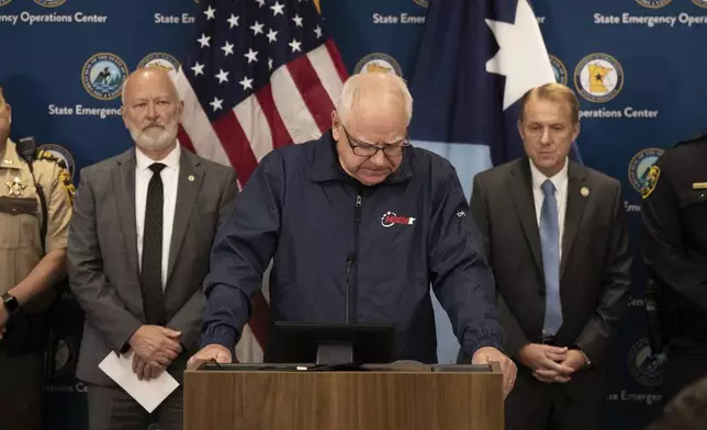Minnesota Gov. Tim Walz pauses as he speaks about the killing of state Rep. Melissa Hortman and her husband at the State Emergency operations Center in Blaine, Minn.. Saturday, June 14, 2025. (Jerry Holt/Star Tribune via AP)