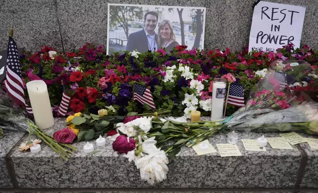 A memorial for Minnesota state Rep. Melissa Hortman and her husband Mark is seen at the state Capitol, Sunday, June 15, 2025, in St. Paul, Minn. (AP Photo/George Walker IV)