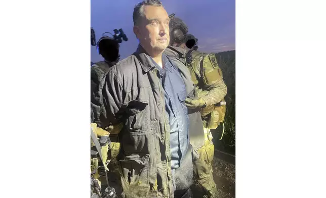 This photo made available by the Ramsey County Sheriff's Office shows Vance Luther Boelter, the man accused of assassinating the top Democrat in the Minnesota House, as he was arrested late Sunday, June 15, 2025. (Ramsey County Sheriff's Office via AP)