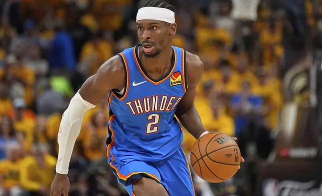 Oklahoma City Thunder guard Shai Gilgeous-Alexander (2) moves the ball up court against the Indiana Pacers during the second half of Game 6 of the NBA Finals basketball series, Thursday, June 19, 2025, in Indianapolis. (AP Photo/Abbie Parr)
