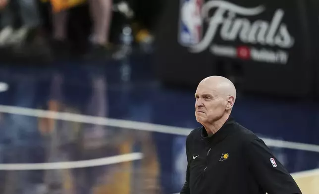 Indiana Pacers head coach Rick Carlisle watches during the second half of Game 6 of the NBA Finals basketball series against the Oklahoma City Thunder, Thursday, June 19, 2025, in Indianapolis. (AP Photo/Michael Conroy)