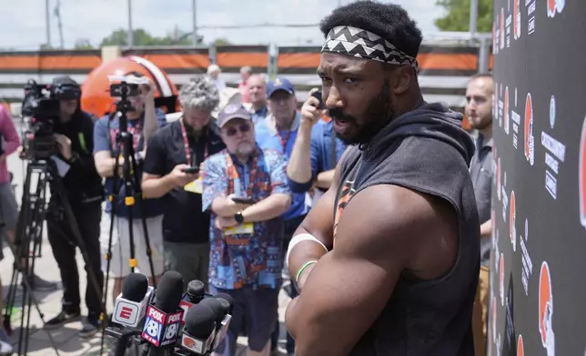 Cleveland Browns defensive end Myles Garrett answers a question during a news conference at NFL football minicamp in Berea, Ohio, Tuesday, June 10, 2025. (AP Photo/Sue Ogrocki)