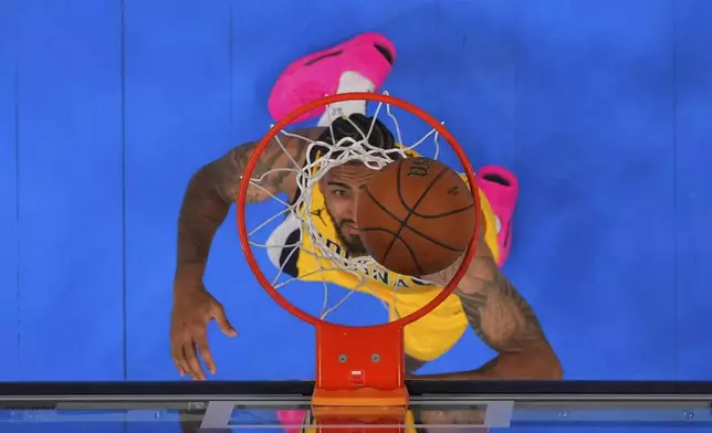 Indiana Pacers forward Obi Toppin (1) looks up at the hoop during the second half in Game 1 of the NBA Finals basketball series against the Oklahoma City Thunder Friday, June 6, 2025, in Oklahoma City. (Julio Cortez/Pool Photo via AP)