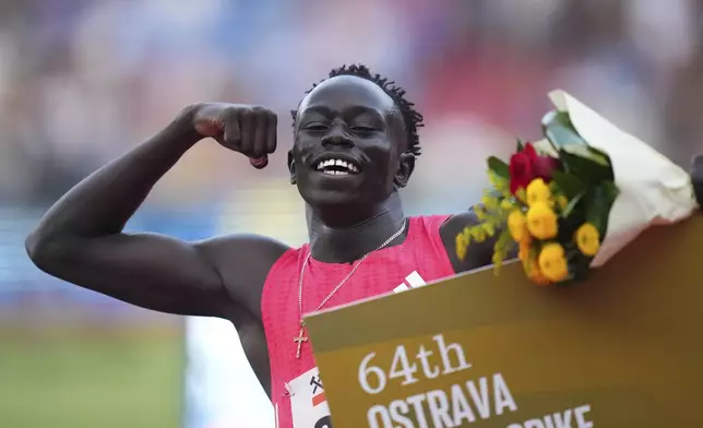 Gout Gout, of Australia, celebrates after winning the men 200 meters during the Ostrava Golden Spike athletics meet in Ostrava, Czech Republic, Tuesday, June 24, 2025. (AP Photo/Petr David Josek)