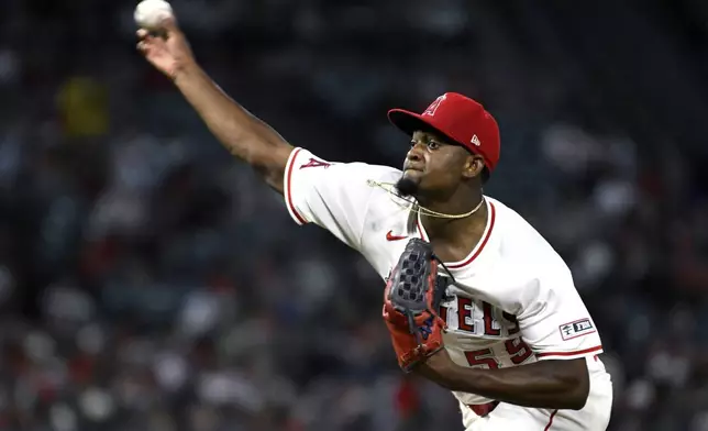 Los Angeles Angels pitcher José Soriano throws against the Houston Astros in the seventh inning of a baseball game Saturday, June 21, 2025, in Anaheim, Calif. (AP Photo/Wally Skalij)