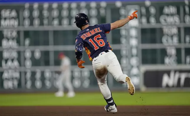Houston Astros' Cooper Hummel celebrates after hitting a home run against the Philadelphia Phillies during the eighth inning of a baseball game Tuesday, June 24, 2025, in Houston. (AP Photo/David J. Phillip)