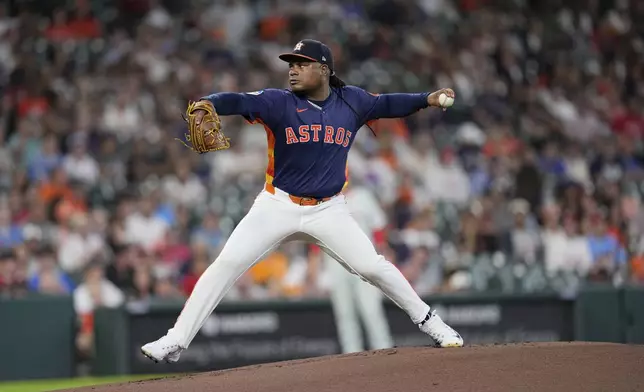 Houston Astros starting pitcher Framber Valdez throws against the Philadelphia Phillies during the first inning of a baseball game Tuesday, June 24, 2025, in Houston. (AP Photo/David J. Phillip)