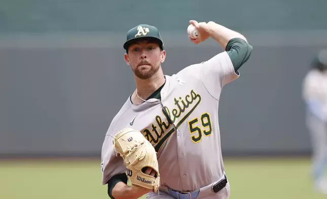 Athletics pitcher Jeffrey Springs throes from the mound during the first inning of a baseball game against the Kansas City Royals in Kansas City, Mo., Sunday, June 15, 2025. (AP Photo/Colin E. Braley)