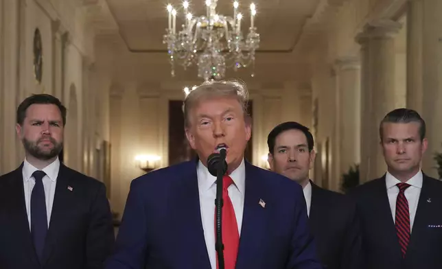 President Donald Trump speaks from the East Room of the White House in Washington, Saturday, June 21, 2025, after the U.S. military struck three Iranian nuclear and military sites, directly joining Israel's effort to decapitate the country's nuclear program, as Vice President JD Vance, Secretary of State Marco Rubio and Defense Secretary Pete Hegseth listen. (Carlos Barria/Pool via AP)