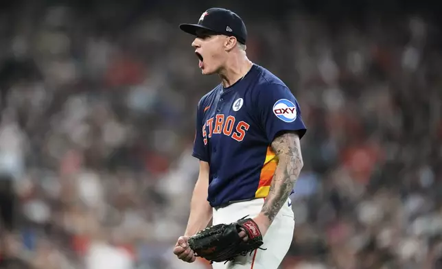 Houston Astros starting pitcher Hunter Brown reacts after Tampa Bay Rays designated hitter Yandy Diaz grounds out during the sixth inning of a baseball game in Houston, Sunday, June 1, 2025. (AP Photo/Ashley Landis)