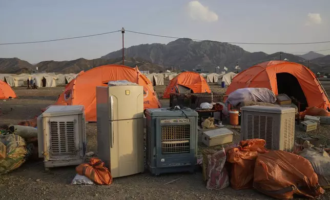 Household belongings of a refugee family repatriated from Pakistan sit at a camp housing Afghan refugees at the Pakistan-Afghanistan border in Torkham, Afghanistan, Saturday, May 31, 2025. (AP Photo/Ebrahim Noroozi)