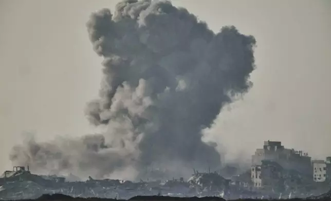 Smoke rises to the sky following an Israeli strike in the Gaza Strip as seen from southern Israel, Wednesday, June 11, 2025. (AP Photo/Ariel Schalit)