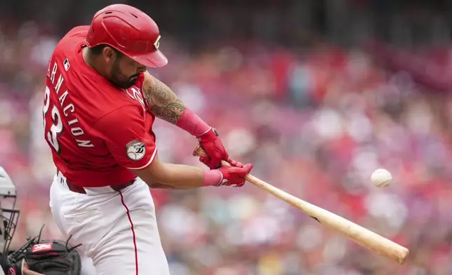 Cincinnati Reds' Christian Encarnacion-Strand hits a three-run home run during the first inning of a baseball game against the Arizona Diamondbacks, Saturday, June 7, 2025, in Cincinnati. (AP Photo/Jeff Dean)