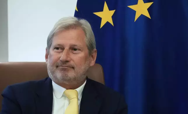 The European Union special envoy for Cyprus Johannes Chan meets with Cyprus' President Nikos Christodoulides at the presidential palace in divided capital Nicosia, Cyprus, Tuesday, June 24, 2025. (AP Photo/Petros Karadjias)