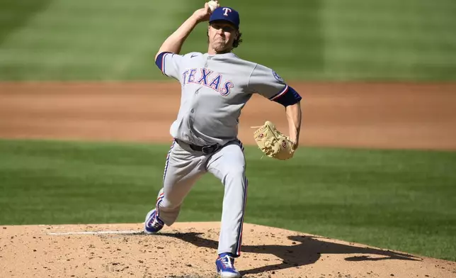 Texas Rangers starting pitcher Jacob deGrom throws during the second inning of a baseball game against the Washington Nationals, Saturday, June 7, 2025, in Washington. (AP Photo/Nick Wass)