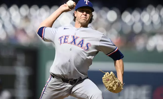 Texas Rangers starting pitcher Jacob deGrom throws during the first inning of a baseball game against the Washington Nationals, Saturday, June 7, 2025, in Washington. (AP Photo/Nick Wass)