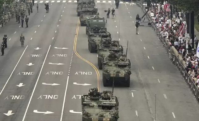 A military parade commemorating the Army's 250th anniversary and coinciding with President Donald Trump's 79th birthday, Saturday, June 14, 2025, in Washington. (AP Photo/Jacquelyn Martin)