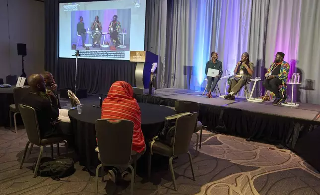 Steven Muleme, of Uganda, Executive Director of Visual Echoes for Human Rights Advocacy (VEHRA), Essy Adhiambo, of Kenya, founder and Executive Director of INEND, a human rights organization for gender minorities in Kenya, and Gilbert Mitullah, of Kenya, Executive Director of the Alliance for Strategic Minority Leadership, attend a forum about the African Continent, Wednesday, June 4, 2025, during the Human Rights Conference at World Pride, in Washington. (AP Photo/Jacquelyn Martin)