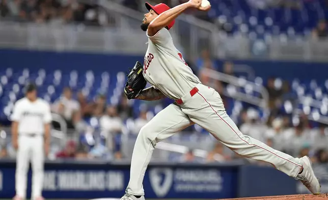 Philadelphia Phillies pitcher Cristopher Sánchez throws to a Miami Marlins hitter during the first inning of a baseball game, Thursday, June 19, 2025, in Miami. (AP Photo/Michael Laughlin)