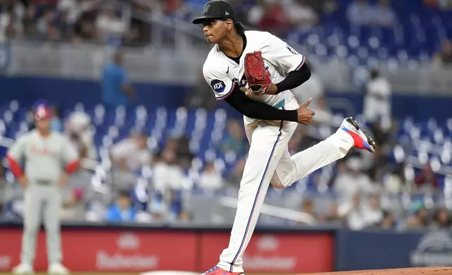 Miami Marlins pitcher Edward Cabrera throws to a Philadelphia Phillies hitter during the first inning of a baseball game, Thursday, June 19, 2025, in Miami. (AP Photo/Michael Laughlin)