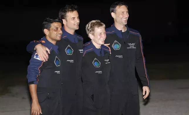 SpaceX Falcon 9 crew, Shubhanshu Shukla of the Indian Space Research Organization, from left, Tibor Kapu of Hungary, commander Peggy Whitson, and Slawosz Uznanski-Wisniewski of Poland, pose for a photo before departing for a launch to the International Space Station at the Kennedy Space Center in Cape Canaveral, Fla., Tuesday, June 24, 2025. (AP Photo/Terry Renna)