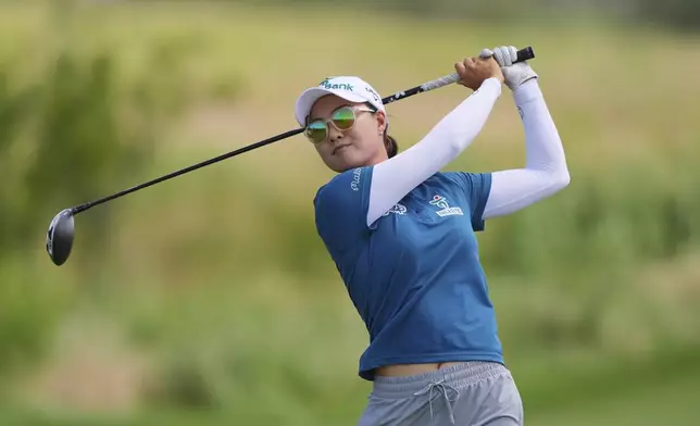 Minjee Lee hits a tee shot on the first hole during the final round of the Women's PGA Championship golf tournament Sunday, June 22, 2025, in Frisco, Texas. (AP Photo/LM Otero)